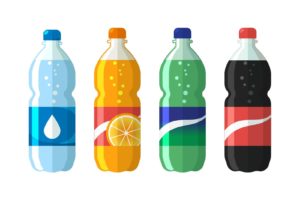 4 bottles of fizzy drink in a row of varying colours.